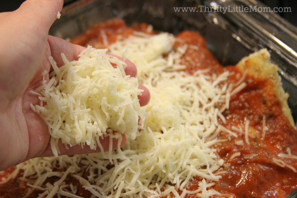 Spreading Cheese for Chicken Parmesan