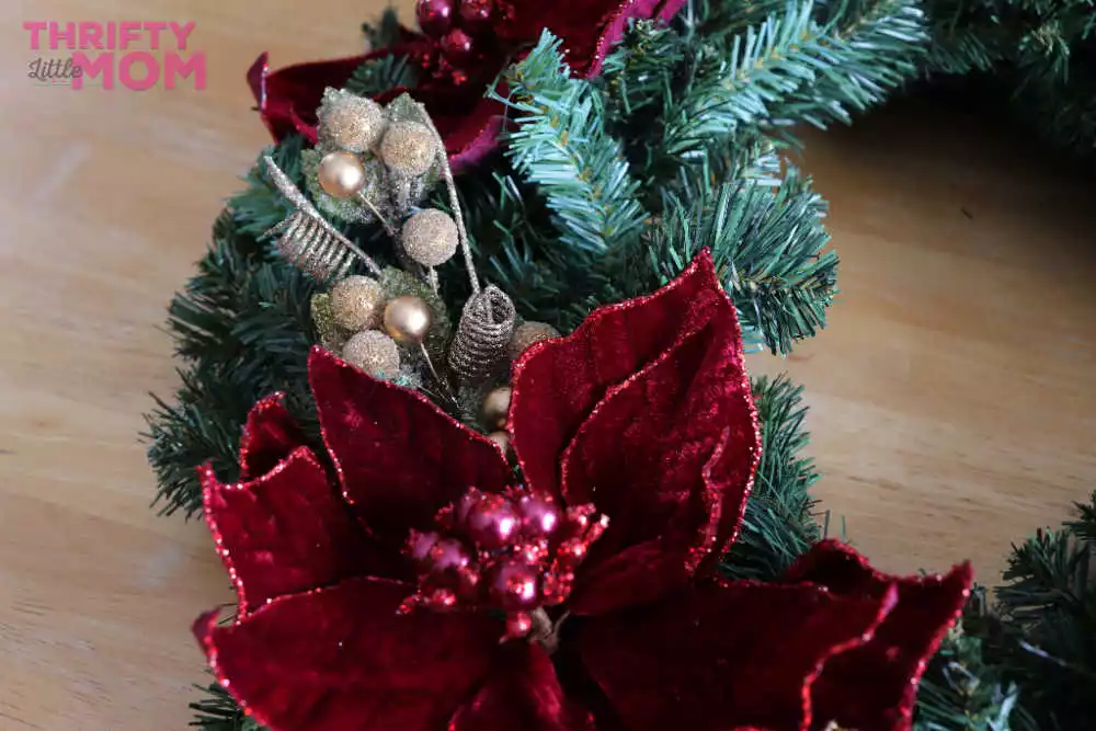 decorative items on poinsettia decor wreath