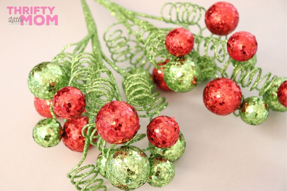 https://thriftylittlemom.com/wp-content/uploads/2019/11/grinch_christmas_tree_pom_pom_twigs-1.jpg