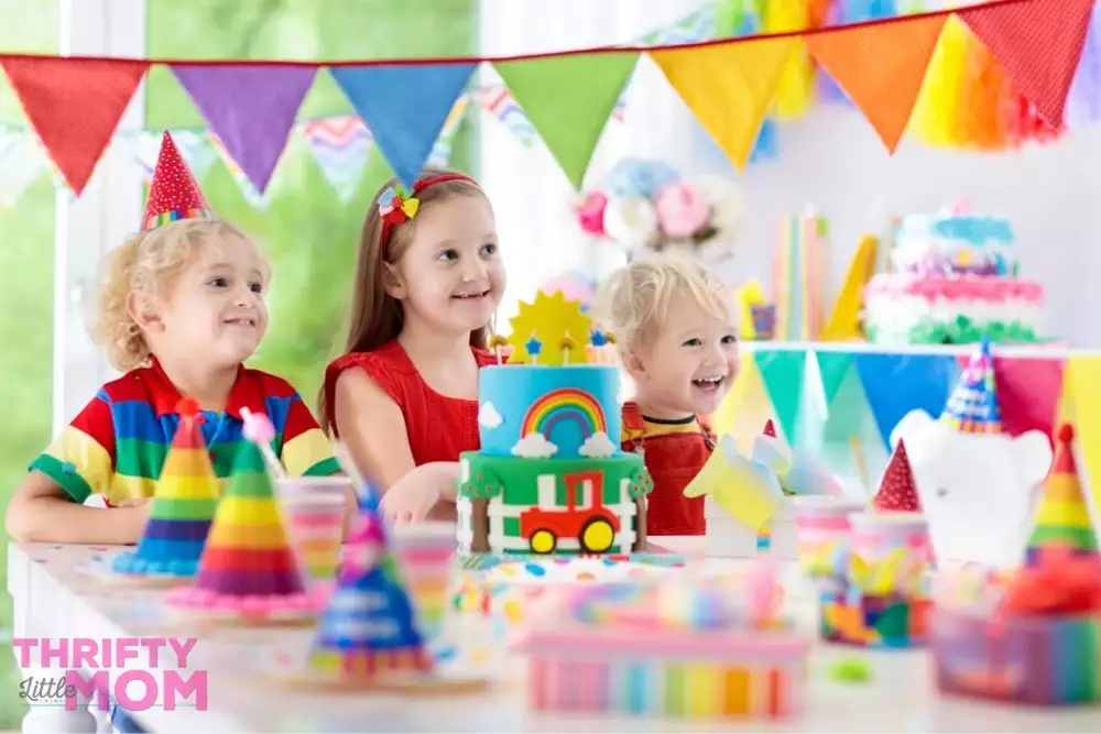 small children enjoying a rainbow party