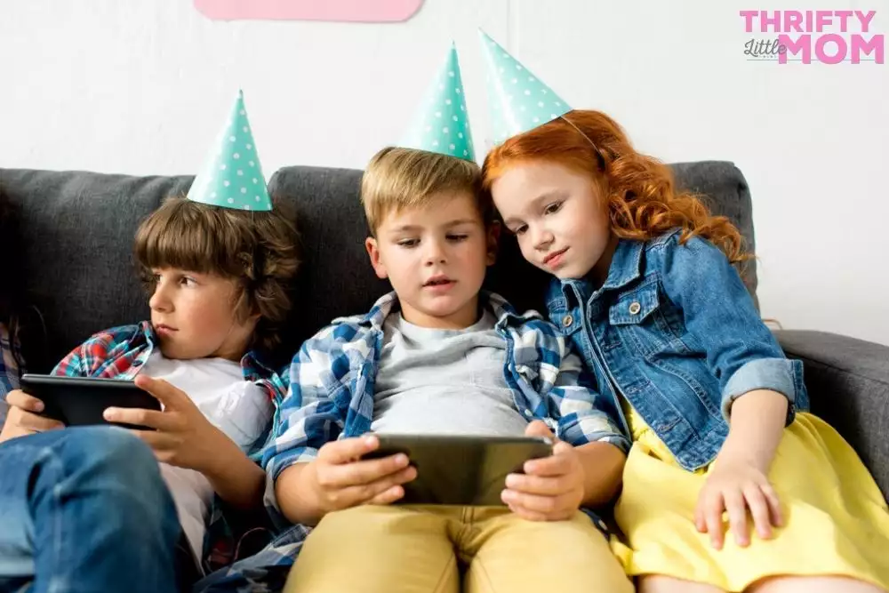 kids playing video games for an 8 year old birthday party idea