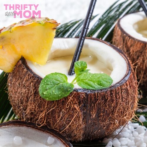 drink out of coconuts for a luau party idea